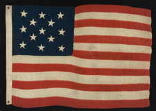 13 STARS IN A 3-2-3-2-3 CONFIGURATION ON A SMALL SCALE FLAG WITH "SQUARISH" PROPORTIONS, 1895-1926