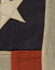 13 STAR U.S. NAVY SMALL BOAT ENSIGN MADE AT THE BROOKLYN NAVY YARD, NEW YORK, DATED 1907, PROBABLY PRODUCED TO OUTFIT TEDDY ROOSEVELT'S GREAT WHITE FLEET