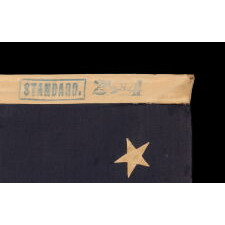 13 STAR ANTIQUE AMERICAN FLAG WITH A MEDALLION CONFIGURATION OF STARS; A SMALL-SCALE EXAMPLE, MADE CIRCA 1895-1926