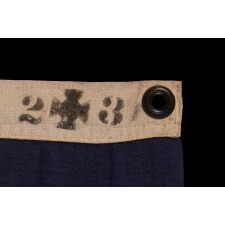 13 STAR ANTIQUE AMERICAN FLAG WITH A 3-2-3-2-3 CONFIGURATION OF STARS ON AN ATTRACTIVE, INDIGO BLUE CANTON; A SMALL-SCALE EXAMPLE OF THE 1895-1926 ERA, INSCRIBED WITH THE SURNAME “SPENGE,” LIKELY PRODUCED BY A MAKER WITH LINKS TO THE U.S. ARMY’S 19th CORPS