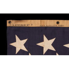 13 STAR ANTIQUE AMERICAN FLAG w/ A 3-2-3-2-3 PATTERN OF ESPECIALLY LARGE STARS; A U.S. NAVY SMALL BOAT ENSIGN, SIGNED & DATED 1903, MADE AT THE BROOKLYN NAVY YARD IN NEW YORK CITY