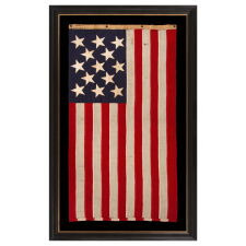13 STAR ANTIQUE AMERICAN FLAG w/ A 3-2-3-2-3 PATTERN OF ESPECIALLY LARGE STARS; A U.S. NAVY SMALL BOAT ENSIGN, SIGNED & DATED 1903, MADE AT THE BROOKLYN NAVY YARD IN NEW YORK CITY