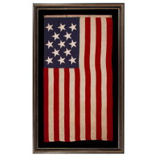13 STAR ANTIQUE AMERICAN FLAG WITH A 3-2-3-2-3 PATTERN OF ESPECIALLY LARGE STARS; A U.S. NAVY SMALL BOAT ENSIGN, SIGNED & DATED 1914, MADE AT THE BROOKLYN NAVY YARD IN NEW YORK CITY