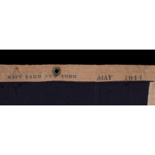 13 STAR ANTIQUE AMERICAN FLAG WITH A 3-2-3-2-3 PATTERN OF ESPECIALLY LARGE STARS; A U.S. NAVY SMALL BOAT ENSIGN, SIGNED & DATED 1914, MADE AT THE BROOKLYN NAVY YARD IN NEW YORK CITY