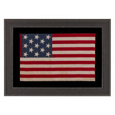 13 STAR ANTIQUE AMERICAN PARADE FLAG, WITH A 3-2-3-2-3 CONFIGURATION OF STARS, AN EXTREMELY SCARCE AND UNUSUALLY LARGE VARIETY, MADE circa 1876-1899