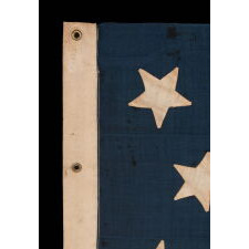 13 STAR FLAG OF THE CIVIL WAR PERIOD, WITH A DIAMOND SHAPED CONFIGURATION OF STARS; ONE OF JUST TWO EARLY EXAMPLES OF THE STARS & STRIPES, WITH SEWN CONSTRUCTION, TO SHARE A VARIANT OF THIS EXTREMELY RARE DESIGN, circa 1863-1865