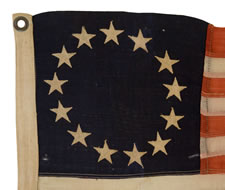 13 STARS IN THE BETSY ROSS PATTERN, AN EXTREMELY SCARCE SEWN EXAMPLE IN A TINY SIZE, 1895-1926