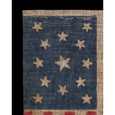 13 STARS IN A MEDALLION PATTERN, ON AN ANTIQUE AMERICAN PARADE MADE FOR THE 1876 CENTENNIAL OF AMERICAN INDEPENDENCE, IN AN UNUSUALLY LARGE SIZE AMONG ITS COUNTERPARTS; FORMERLY IN THE MASTAI COLLECTION, MARKED IN THEIR TRADITIONAL FASHION