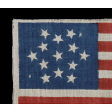 13 STARS IN A SIX-POINTED GREAT STAR / STAR OF DAVID PATTERN, ON AN ANTIQUE AMERICAN FLAG MADE FOR THE 1876 CENTENNIAL OF AMERICAN INDEPENDENCE, FORMERLY IN THE MASTAI COLLECTION