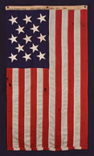 13 STARS, A US NAVY SMALL BOAT ENSIGN, MARKED NAVY YARD, NEW YORK, DATED 1912, SCARCE SMALL SIZE