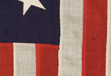 13 STARS, A US NAVY SMALL BOAT ENSIGN, MARKED NAVY YARD, NEW YORK, DATED 1912, SCARCE SMALL SIZE