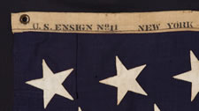 13 STARS, A US NAVY SMALL BOAT ENSIGN, MARKED NAVY YARD, NEW YORK, DATED 1912, SCARCE SMALL SIZE