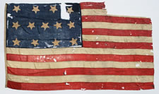 ANTIQUE AMERICAN FLAG WITH 13 STARS, AN EXTRAORDINARY SURVIVOR OF THE 1820-1840 PERIOD OR PRIOR; FORMERLY ACCOMPANIED THE "EASTON FLAG" AT THE EASTON PUBLIC LIBRARY IN NORTHAMPTON COUNTY, PENNSYLVANIA