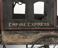 FANTASTIC AMERICAN LOCOMOTIVE PEDAL VEHICLE, WITH GREAT FOLK QUALITIES, MADE IN THE FORM OF THE FAMOUS NEW YORK EMPIRE EXPRESS, CA 1895-1910