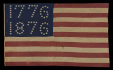 CENTENNIAL CELEBRATION FLAG WITH 10-POINTED STARS THAT SPELL "1776 - 1876", ONE OF THE MOST GRAPHIC OF ALL EARLY EXAMPLES