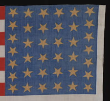 38 STAR ANTIQUE FLAG WITH "1876 CENTENNIAL" ADVERTISING & GOLD STARS, MADE FOR THE PHILADELPHIA CENTENNIAL INTERNATIONAL EXPOSITION