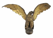 LARGE AND IMPRESSIVE PRESSED BRASS EAGLE, AN EARLY PARADE FLAG HOLDER & BUNTING TIE-BACK, MADE IN NEW YORK, PATENTED 1891
