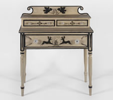 PAINT-DECORATED DRESSING TABLE FROM THE NEW PORTLAND AREA OF MAINE, WITH TWO LEAPING STAGS OR REINDEER, THE ONLY NEW ENGLAND DRESSING TABLE I HAVE EVER ENCOUNTERED WITH ANIMAL IMAGERY, CA 1830
