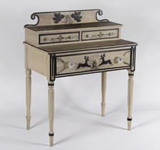 PAINT-DECORATED DRESSING TABLE FROM THE NEW PORTLAND AREA OF MAINE, WITH TWO LEAPING STAGS OR REINDEER, THE ONLY NEW ENGLAND DRESSING TABLE I HAVE EVER ENCOUNTERED WITH ANIMAL IMAGERY, CA 1830