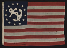 ANTIQUE PRIVATE YACHT FLAG (ENSIGN) WITH 13 STARS AND A FOULED ANCHOR, MARKED "U.S. ARMY STANDARD BUNTING", 1895-1910 ERA