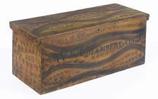 BLANKET CHEST WITH BLACK BRUSHING AND SPONGING OVER CHROME YELLOW AND BEARING THE NAME "WM, CHAMBERLAIN, JR", NEW ENGLAND ORIGIN, FOUND IN VERMONT,  1800-1830