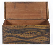 BLANKET CHEST WITH BLACK BRUSHING AND SPONGING OVER CHROME YELLOW AND BEARING THE NAME "WM, CHAMBERLAIN, JR", NEW ENGLAND ORIGIN, FOUND IN VERMONT,  1800-1830