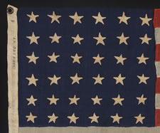 36 STARS, CIVIL WAR ERA, MADE BY ANNIN IN NEW YORK CITY, IN AN UNUSUAL TINY SIZE FOR THE PERIOD AND ENTIRELY HAND-SEWN, NEVADA STATEHOOD, 1864-67