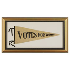 TRIANGULAR FELT WOMEN'S SUFFRAGETTE PENNANT WITH PRINTED TEXT THAT READS "VOTES FOR WOMEN", 1910-1920