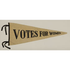 TRIANGULAR FELT WOMEN'S SUFFRAGETTE PENNANT WITH PRINTED TEXT THAT READS "VOTES FOR WOMEN", 1910-1920