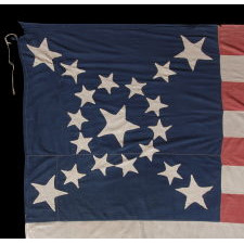 19 STARS IN AN SPECTACULAR STARBURST MEDALLION UNIQUE TO THIS FLAG, MADE SOMETIME BETWEEN THE CIVIL WAR (1861-65) AND THE OPENING OF THE 1890'S, EITHER TO REFLECT NORTHERN SYMPATHIES, BY REPRESENTING THE COMPLEMENT OF UNION-SUPPORTING STATES AT THE TIME, OR TO COMMEMORATE INDIANA AS THE 19TH STATE TO JOIN THE UNION