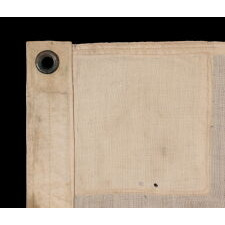 LATE 19th CENTURY FLAG OF THE REVENUE MARINE (a.k.a., REVENUE CUTTER SERVICE), WITH A BLUE EAGLE AMID AN ARCH OF 13 BLUE STARS, ON A WHITE CANTON, AND 16 RED & WHITE, VERTICAL STRIPES, MADE circa 1885-1895