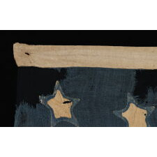24 STAR ANTIQUE AMERICAN FLAG, MADE IN THE PERIOD WHEN MISSOURI WAS THE MOST RECENT STATE TO JOIN THE UNION, 1821-1836; AN EXTREMELY RARE STAR COUNT; EXPERTLY SEWN, BUT WITH HIGHLY UNUSUAL, SINGLE-APPLIQUED STARS THAT EXPOSE A PECULIARLY SMALL WINDOW ON THE REVERSE; EXHIBITED JUNE- SEPTEMBER, 2021 AT THE MUSEUM OF THE AMERICAN REVOLUTION