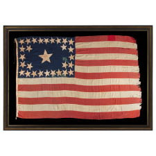 29 STARS IN A SPECTACULAR, RECTANGULAR MEDALLION WITH 4 STARS INSIDE THE PERIMETER AND A HUGE CENTER STAR ON AN OPEN BLUE EXPANSE; AMONG THE RAREST OF ALL KNOWN STAR COUNTS ON PIECED-AND-SEWN EXAMPLES, IOWA STATEHOOD, 1846-48, MEXICAN WAR PERIOD; EXHIBITED FROM JUNE – SEPTEMBER, 2021 AT THE MUSEUM OF THE AMERICAN REVOLUTION