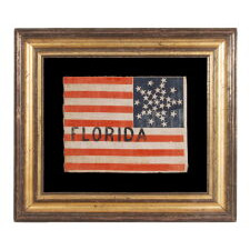 31 STAR ANTIQUE AMERICAN FLAG WITH ITS STARS ARRANGED IN THE “GREAT STAR” PATTERN, WITH A STAR BETWEEN EACH ARM, USED TO MARK THE PLACE WHERE DELEGATES FROM FLORIDA AT THE 1860 ‘WIGWAM’ CONVENTION IN CHICAGO, WHERE ABRAHAM LINCOLN WAS SELECTED FROM THE 3rd BALLOT AS THE REPUBLICAN PARTY’S PRESIDENTIAL NOMINEE; THIS EXACT FLAG ILLUSTRATED IN THE 1997 BOOK “COLLECTING LINCOLN,” BY SCHNEIDER