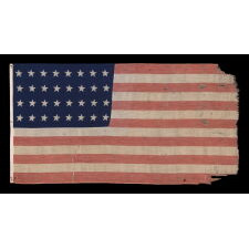 32 STAR ANTIQUE AMERICAN FLAG OF A TYPE KNOWN TO HAVE LIKELY SEEN MILITARY USE, REFLECTS THE ADDITION OF MINNESOTA TO THE UNION IN 1858, AN EXTREMELY RARE FLAG, ACCURATE FOR JUST 9 MONTHS AND OFFICIAL FOR ONLY ONE YEAR