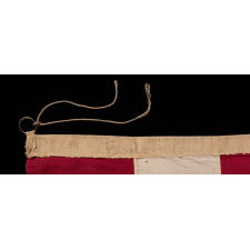 32 STARS IN A VERY UNUSUAL NOTCHED VERSION OF THE “GREAT STAR” PATTERN, WITH TWO STARS ABSENT AT THE EXTREME POINTS OF EACH ARM, MADE IN THE PERIOD WHEN MINNESOTA JOINED THE UNION AS THE 32nd STATE; A VERY RARE STAR COUNT, OFFICIAL FOR JUST ONE YEAR, AND ACCURATE FOR JUST NINE MONTHS, 1858-59