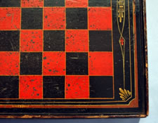 OUTSTANDING 19TH CENTURY AMERICAN CHESS BOARD IN BLACK AND BITTERSWEET ORANGE