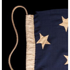 34 STAR ANTIQUE AMERICAN FLAG, ONE OF JUST TWO U.S. NAVY ENSIGNS I HAVE ENCOUNTERED WITH THE BLACK-INKED STENCIL “N.Y. B.” FOR ‘NAVY YARD, BROOKLYN,’ DATED “1859,” TWO YEARS BEFORE KANSAS WAS ADMITTED AS THE 34TH STATE; MARKED WITH THE NAME OF SAMUEL B. CHILDS, A NEW YORK PHYSICIAN WHO CLERKED FOR THE NAVY, AND SON OF A CAREER NAVAL OFFICER, JAMES CHILDS, WHO SERVED FOR 60 YEARS AS A SAILMAKER (1822-1881)