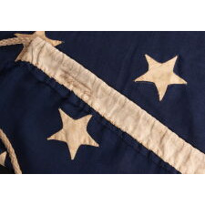 34 STAR ANTIQUE AMERICAN FLAG, ONE OF JUST TWO U.S. NAVY ENSIGNS I HAVE ENCOUNTERED WITH THE BLACK-INKED STENCIL “N.Y. B.” FOR ‘NAVY YARD, BROOKLYN,’ DATED “1859,” TWO YEARS BEFORE KANSAS WAS ADMITTED AS THE 34TH STATE; MARKED WITH THE NAME OF SAMUEL B. CHILDS, A NEW YORK PHYSICIAN WHO CLERKED FOR THE NAVY, AND SON OF A CAREER NAVAL OFFICER, JAMES CHILDS, WHO SERVED FOR 60 YEARS AS A SAILMAKER (1822-1881)