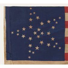 34 STARS IN 3 DIFFERENT SIZES, ARRANGED IN THE "GREAT STAR" OR "GREAT LUMINARY" PATTERN ON A LARGE SCALE CIVIL WAR PERIOD PARADE FLAG, 1861-1863, KANSAS STATEHOOD
