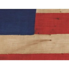 34 STARS IN 3 DIFFERENT SIZES, ARRANGED IN THE "GREAT STAR" OR "GREAT LUMINARY" PATTERN ON A LARGE SCALE CIVIL WAR PERIOD PARADE FLAG, 1861-1863, KANSAS STATEHOOD