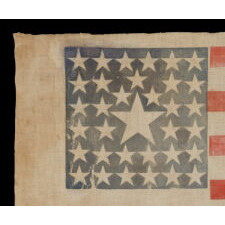 34 STARS IN A VERY RARE PATTERN THAT FEATURES A HUGE CENTER STAR IN THE MIDST OF A LINEAL STAR PATTERN, ONE-OF-A-KIND AMONG KNOWN EXAMPLES, CIVIL WAR PERIOD, 1861-63, KANSAS STATEHOOD