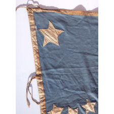 34 STARS IN A WHIMSICAL RENDITION OF THE GREAT STAR PATTERN, ON A CIVIL WAR PERIOD FLAG WITH A CORNFLOWER BLUE CANTON, MADE WHEN KANSAS WAS THE MOST RECENT STATE TO JOIN THE UNION; UPDATED TO 39 STARS, IN 1876, IN ANTICIPATION OF THE ADDITION OF THE DAKOTA TERRITORY AS ONE STATE