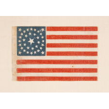 35 STAR ANTIQUE AMERICAN PARADE FLAG WITH A DOUBLE-WREATH STYLE MEDALLION CONFIGURATION OF STARS, PERHAPS THE BEST SURVIVING EXAMPLE IN THIS RARE FORM, CIVIL WAR PERIOD, WEST VIRGINIA STATEHOOD, 1863-1865