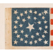 35 STAR ANTIQUE AMERICAN PARADE FLAG WITH A DOUBLE-WREATH STYLE MEDALLION CONFIGURATION OF STARS, PERHAPS THE BEST SURVIVING EXAMPLE IN THIS RARE FORM, CIVIL WAR PERIOD, WEST VIRGINIA STATEHOOD, 1863-1865