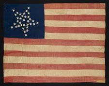 35 STARS IN A "GREAT STAR" PATTERN, A HOMEMADE, CIVIL WAR FLAG WITH ITS CANTON RESTING ON THE WAR STRIPE, WEST VIRGINIA STATEHOOD, 1863-65