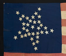 35 STARS IN A "GREAT STAR" PATTERN, A HOMEMADE, CIVIL WAR FLAG WITH ITS CANTON RESTING ON THE WAR STRIPE, WEST VIRGINIA STATEHOOD, 1863-65