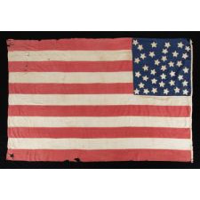 35 STARS ON ONE SIDE AND 36 ON THE OTHER, ARRANGED IN A RARE RANDOM SCATTER WITH NO PARTICULAR PATTERN, ON A CIVIL WAR PERIOD FLAG WITH GREAT FOLK QUALITIES; REPRESENTS THE ADDITION OF BOTH WEST VIRGINIA AND NEVADA, 1863-1865