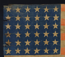 36 STARS, 1864-67, A LARGE SCALE, CIVIL WAR ERA PARADE FLAG WITH ATTRACTIVE WEAR