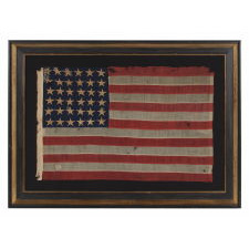 36 STARS, CIVIL WAR ERA, MADE BY ANNIN IN NEW YORK CITY, IN AN UNUSUAL TINY SIZE FOR THE PERIOD AND ENTIRELY HAND-SEWN, PROBABLY CARRIED AS A MILITARY CAMP COLORS OR GUIDON, NEVADA STATEHOOD, 1864-67